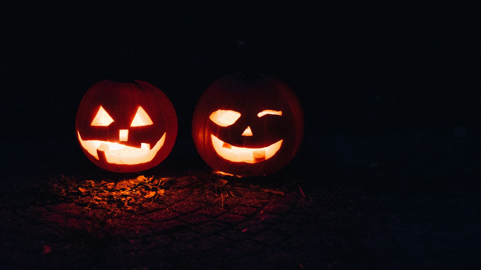 Schafisheim - Halloween 1 two lighted jack-o-lanterns during night time