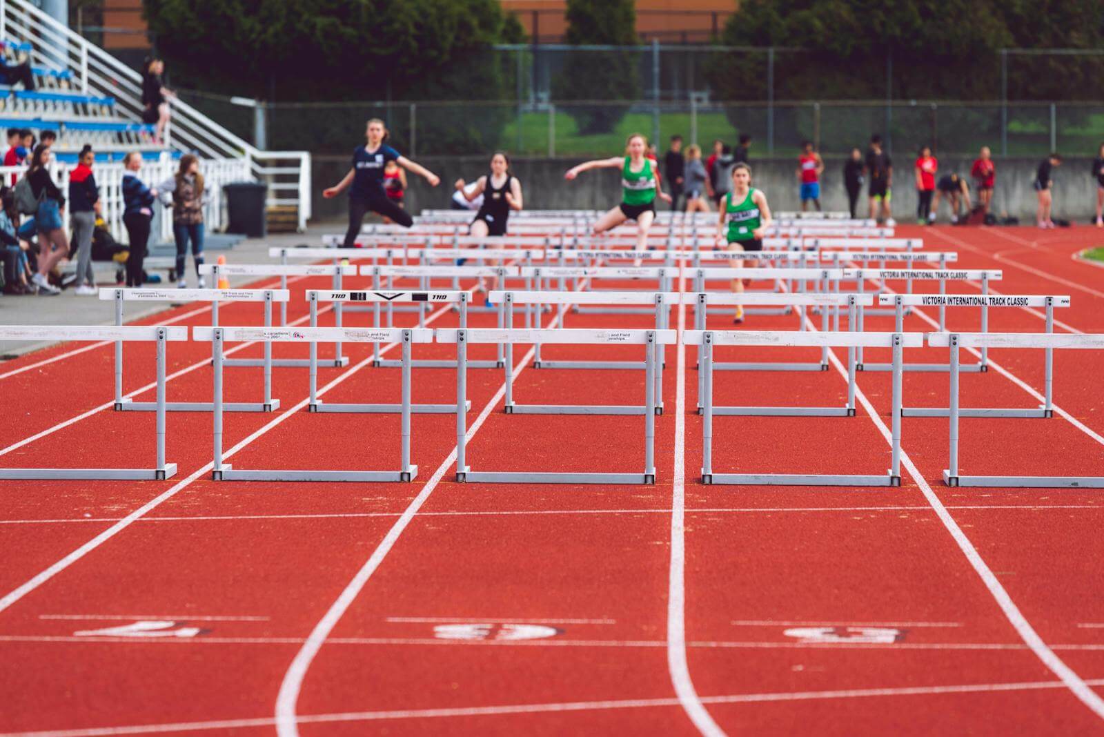 Ferienpass Bremgarten: Olympia Leichtathletik | Shallow Focus Photo of People Playing Track and Field