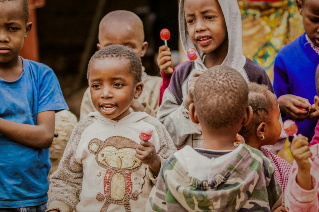 a group of children standing next to each other